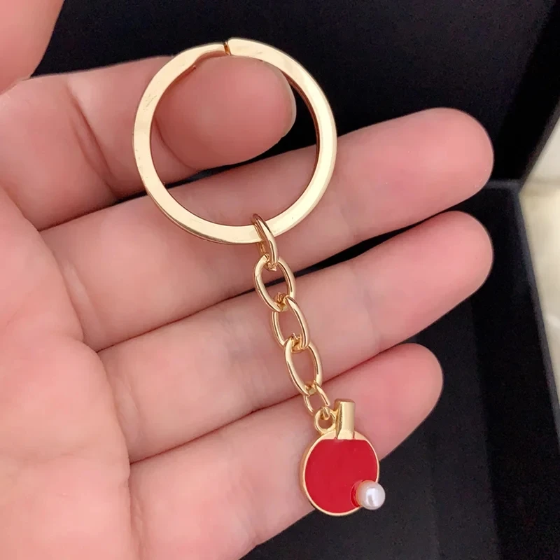 Black Red sports table tennis  - Table Tennis Keychain recension och pris