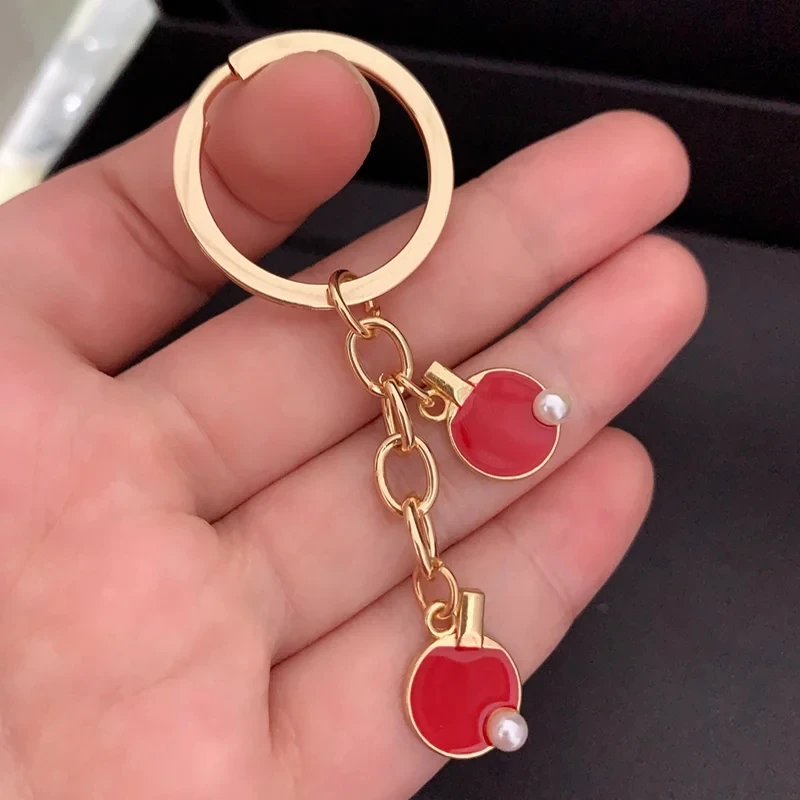 Black Red sports table tennis  - Table Tennis Keychain recension och pris